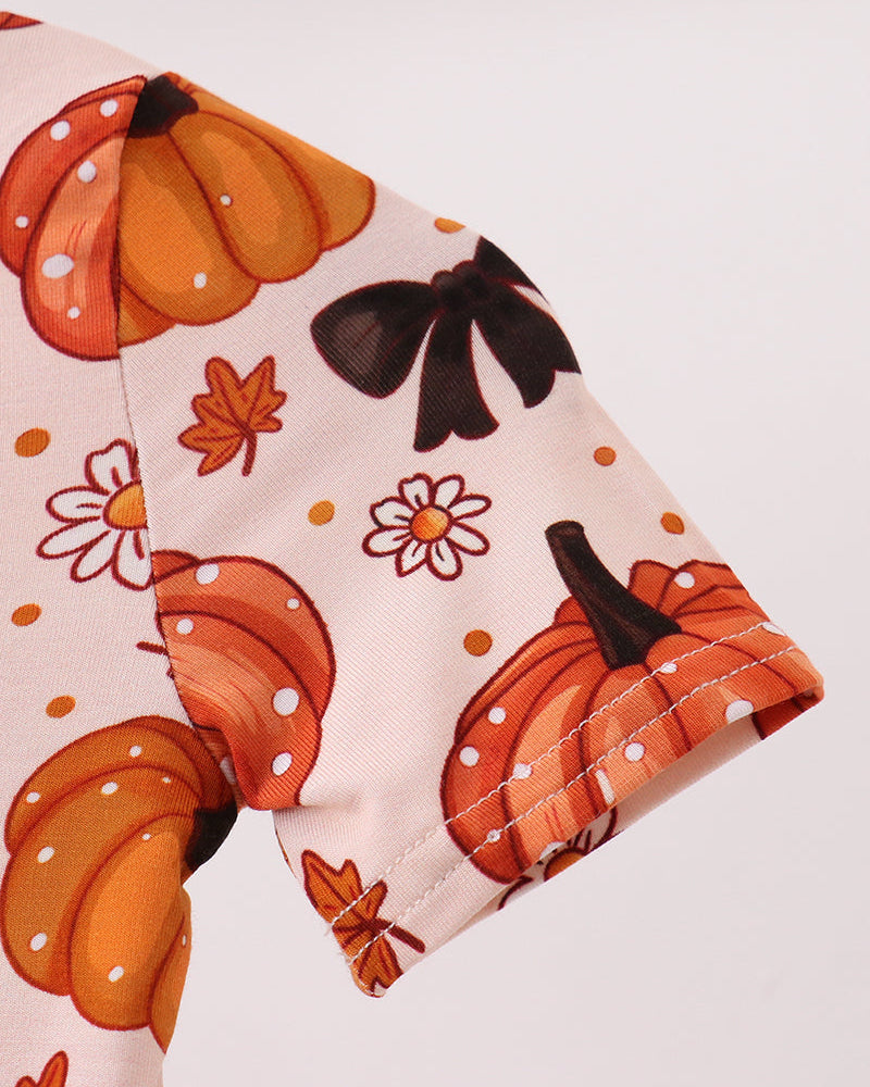 Long sleeve romper with pumpkin and flower pattern, orange-edged cuffs