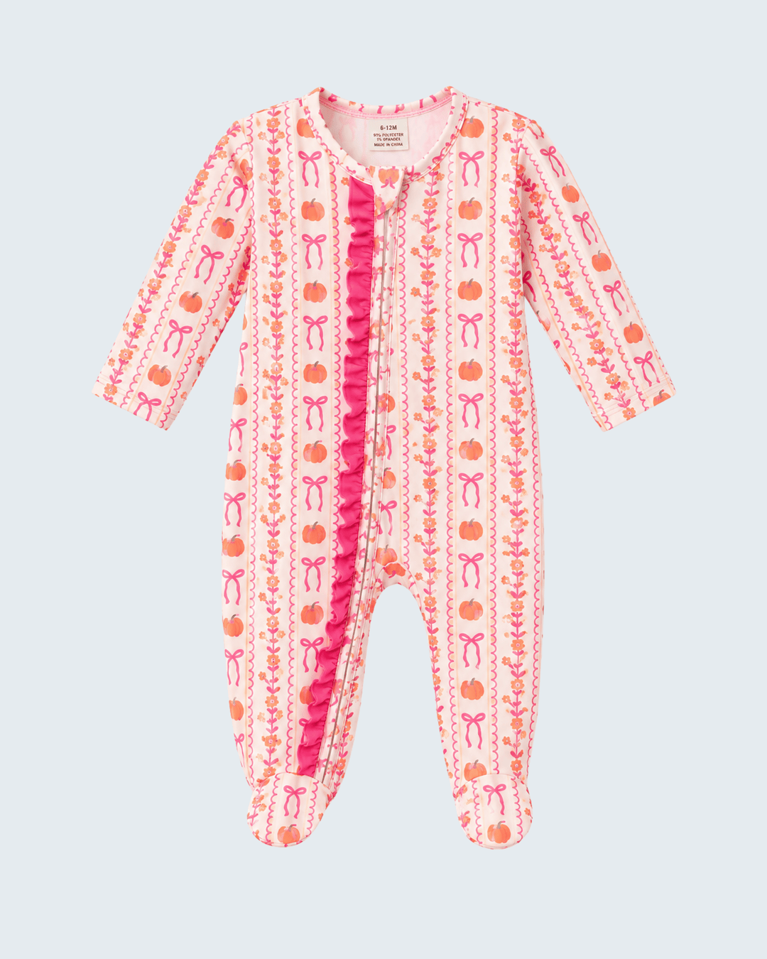 Orange and pink pumpkin-print footed sleeper, long sleeves, snap front