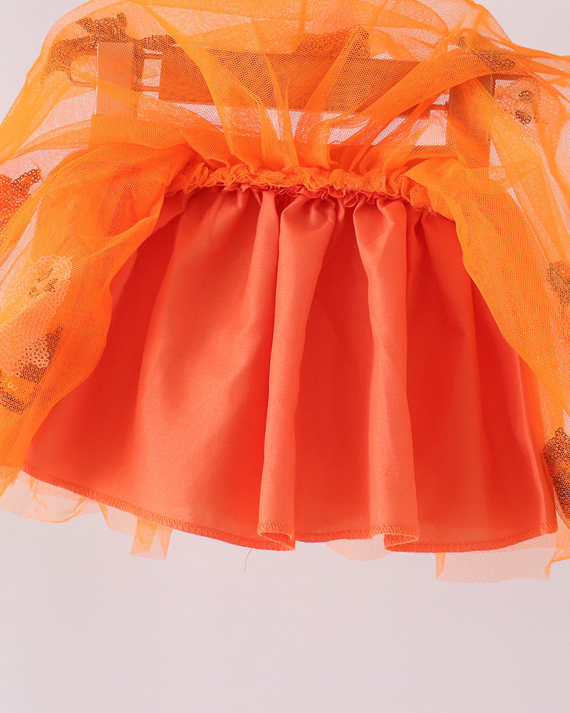 Orange tulle tutu skirt with gathered elastic waistband and layered mesh skirt