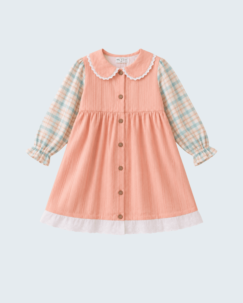 Peach A-line dress with plaid sleeves, Peter Pan collar, front buttons, and lace hem