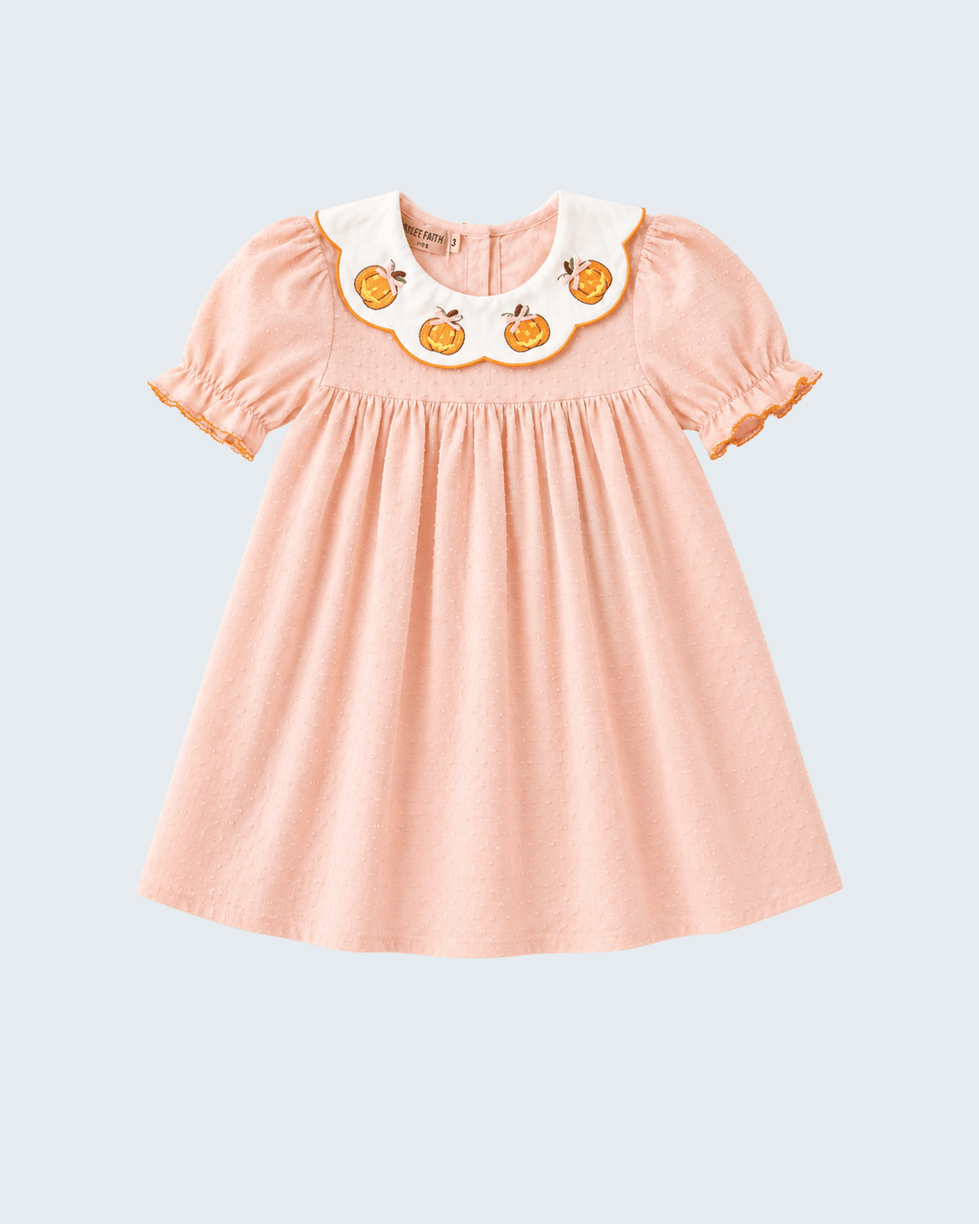 Peach puff-sleeve dress with pumpkin embroidery at scalloped collar