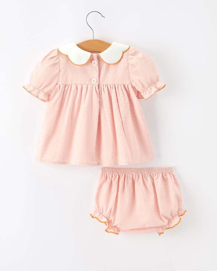 Girls pink dress and bloomer set with button front and pumpkin embroidery details