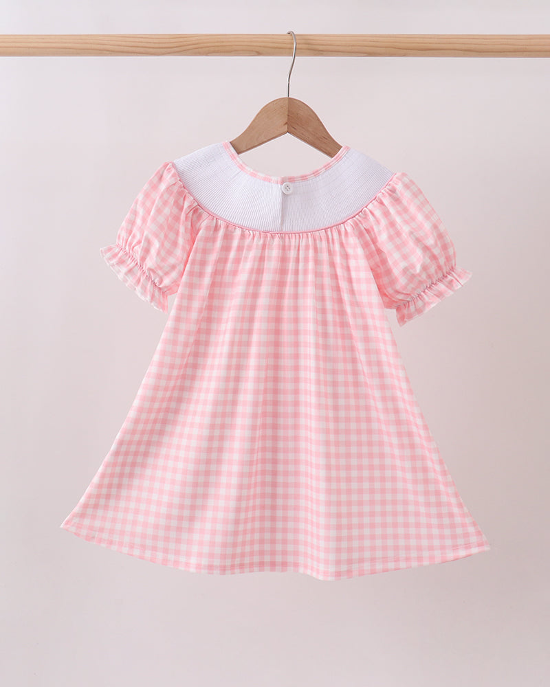 Pink gingham smocked baby dress with short flutter sleeves