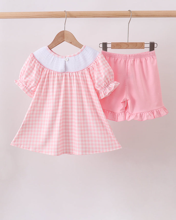 Girls pink check ruffle dress and matching pink skirt, smocked neckline and hem