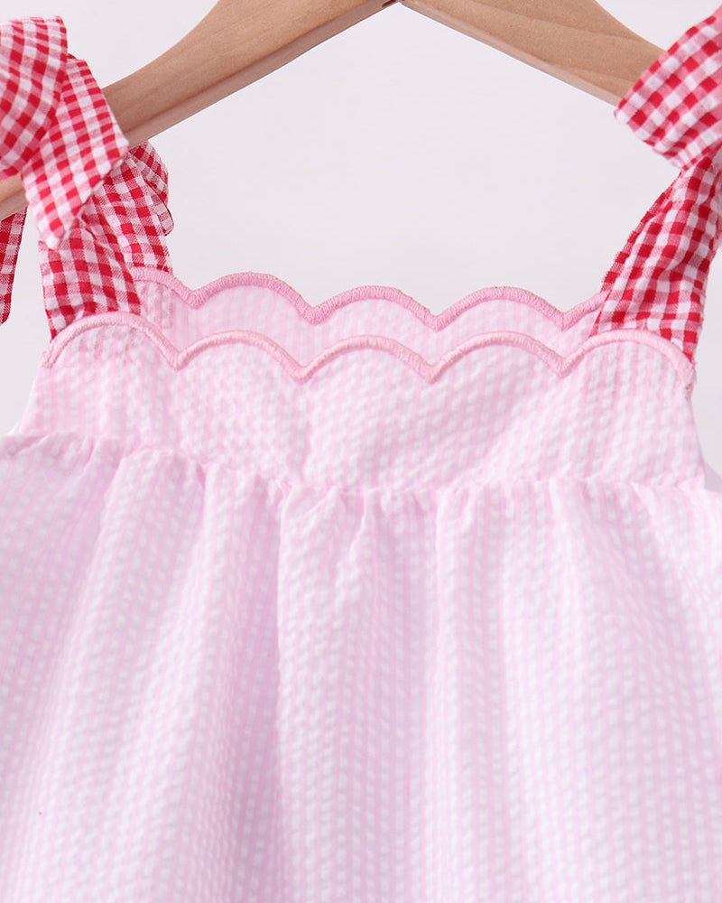 Scallop neckline and red gingham straps