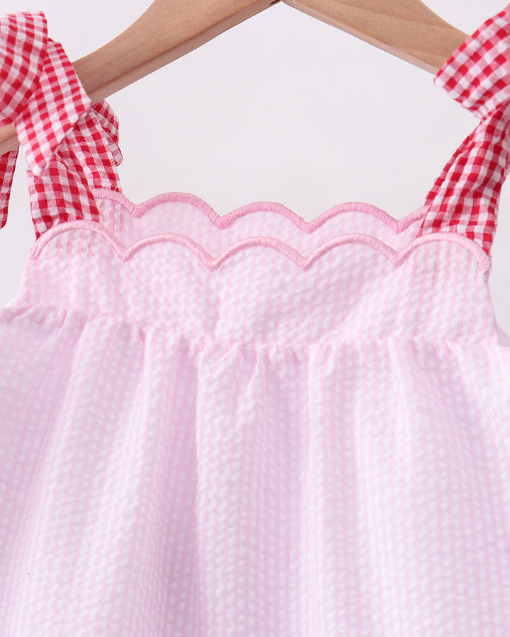 Scallop neckline and red gingham straps