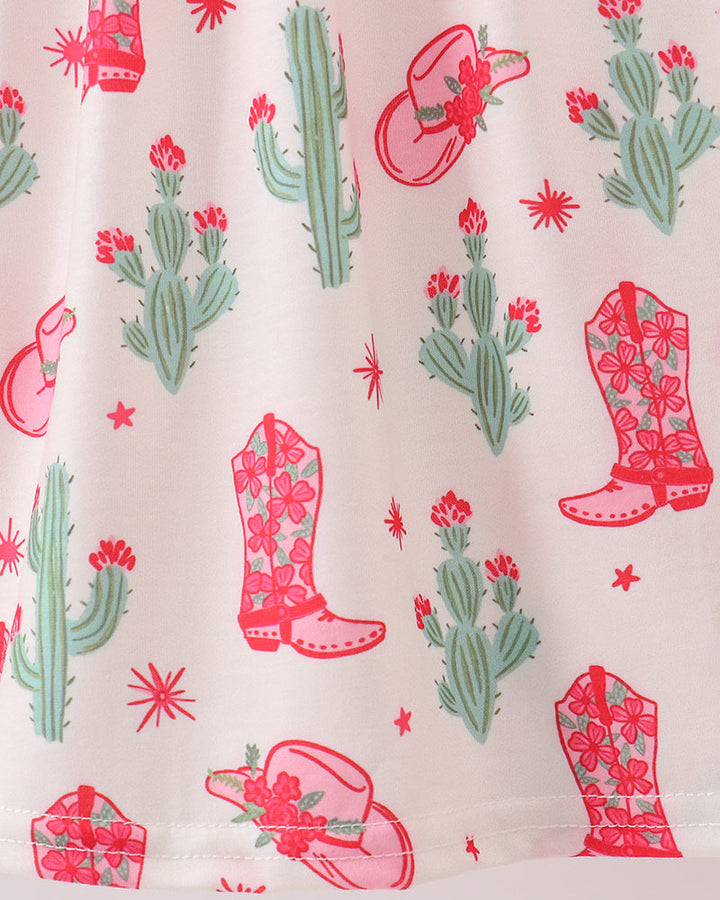 Pattern of red cowboy boots, pink hats, and green cacti on a white background