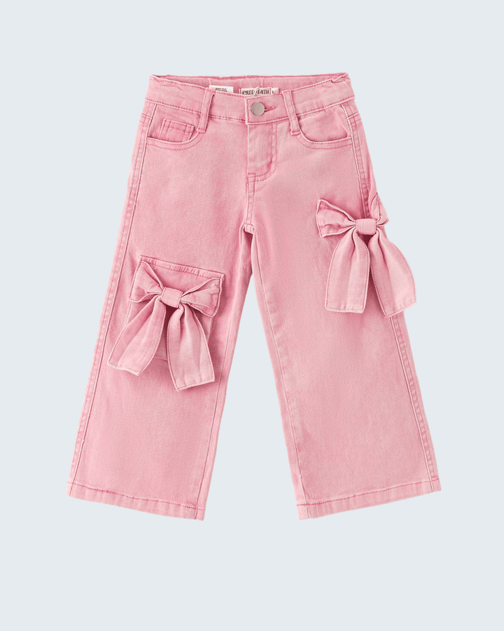 Pink bow denim pants with front button, belt loops, patch pockets, and side ribbon bows