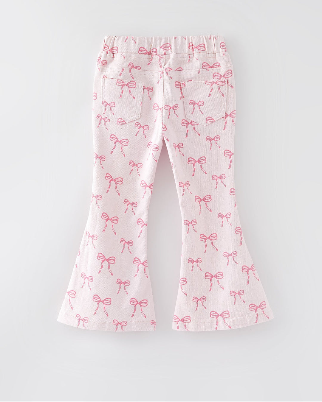Girls flared jeans with pink bow print and elastic waistband, rear view