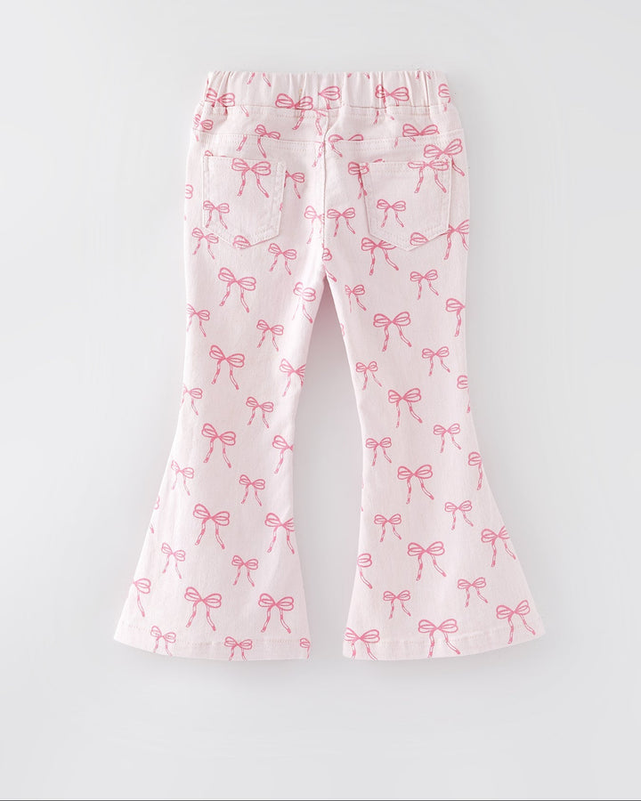 Girls flared jeans with pink bow print and elastic waistband, rear view
