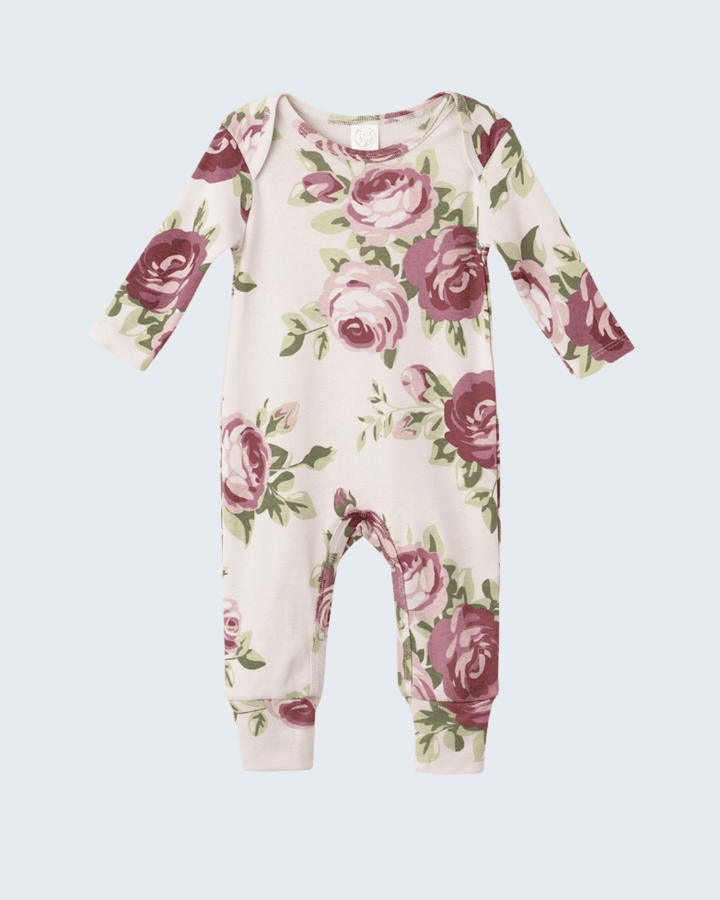 Cotton baby romper with long sleeves, cream base, and pink rose floral print