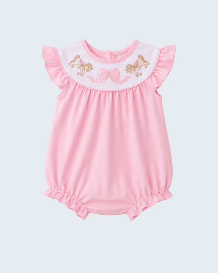 Pink baby romper with butterfly details on a light gray background