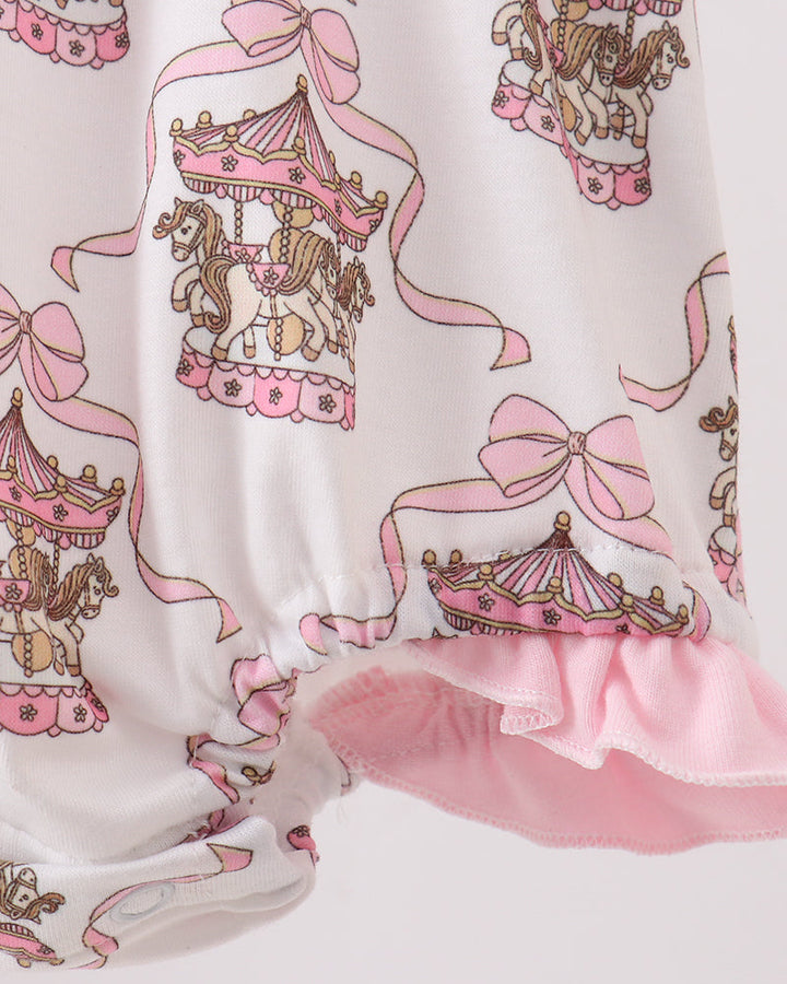 Fabric with carousel and bow pattern on a white background