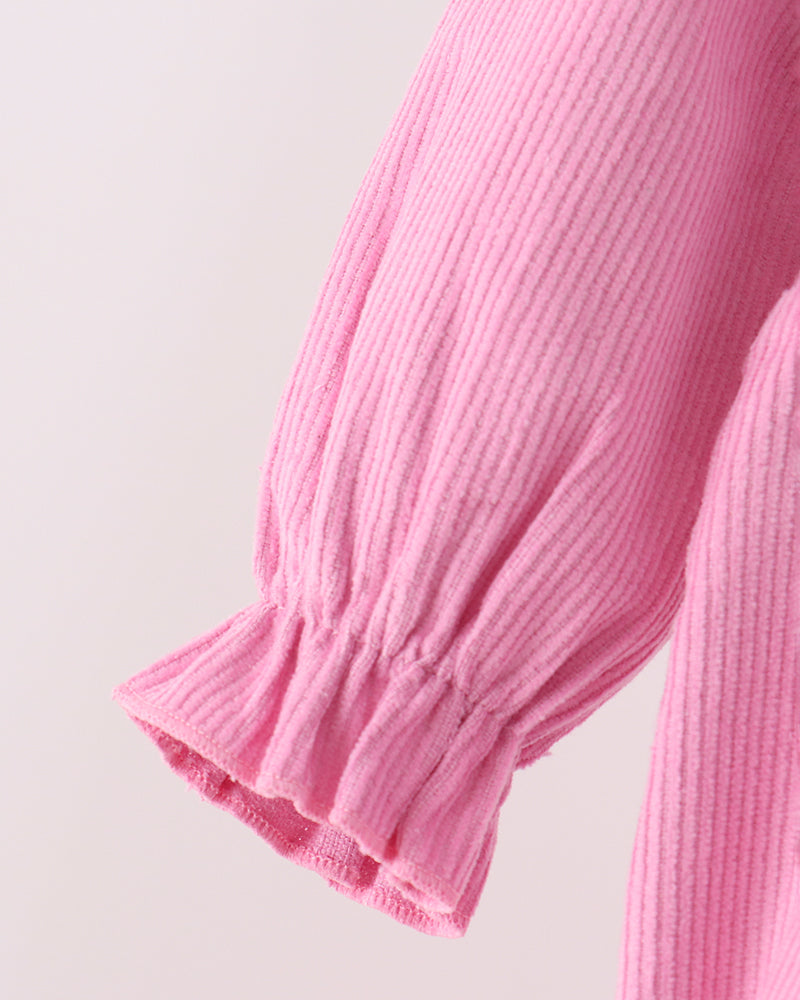 Pink corduroy bubble romper with long sleeves and gathered ruffle cuffs