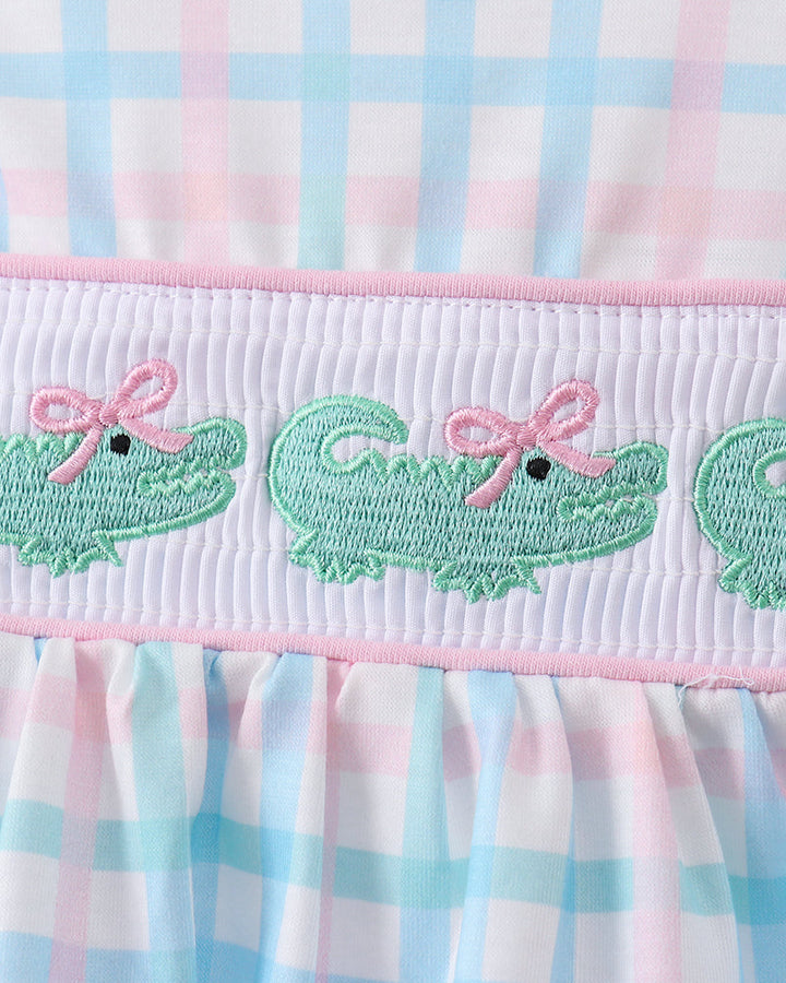 Smocked gingham bloomer set waistband with green crocodile embroidery and pink trim