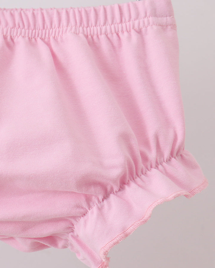 Pink smocked bloomer with elastic waist and ruffled hem