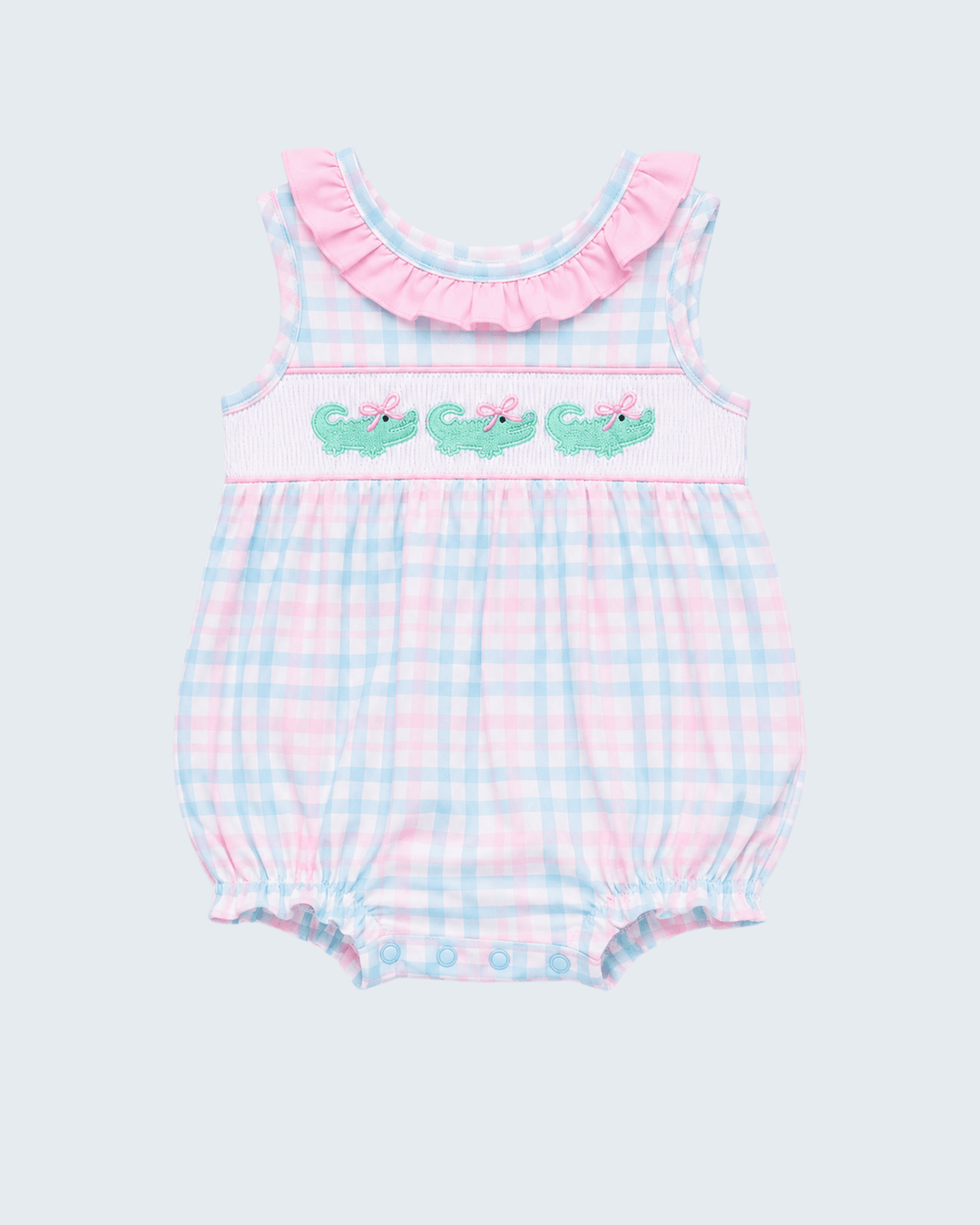 Pink-and-blue gingham baby bubble romper with green crocodile applique and pink bow ruffle