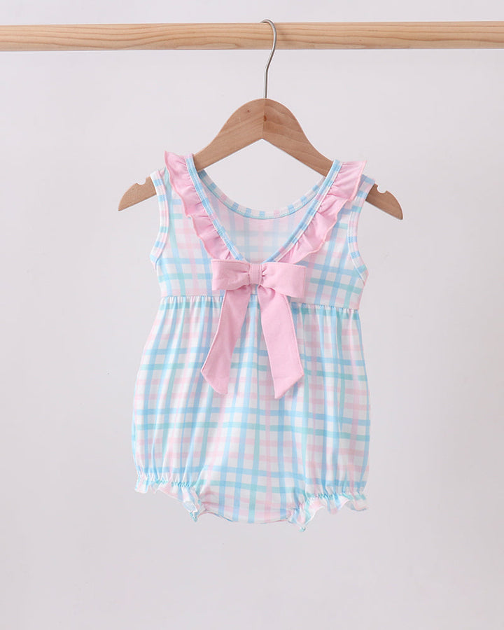 Pink-and-blue gingham baby bubble romper with pink bow, ruffled neckline, and crocodile applique