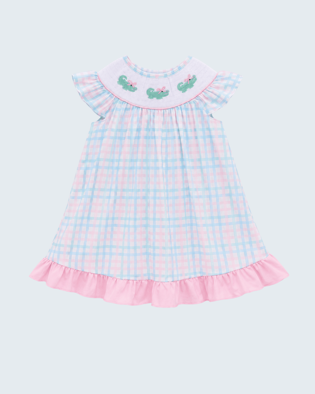 A baby girl's short-sleeve dress featuring a light pink and blue plaid pattern, a ruffled collar with embroidered green caterpillars, and a ruffled hem, shown against a light gray background.