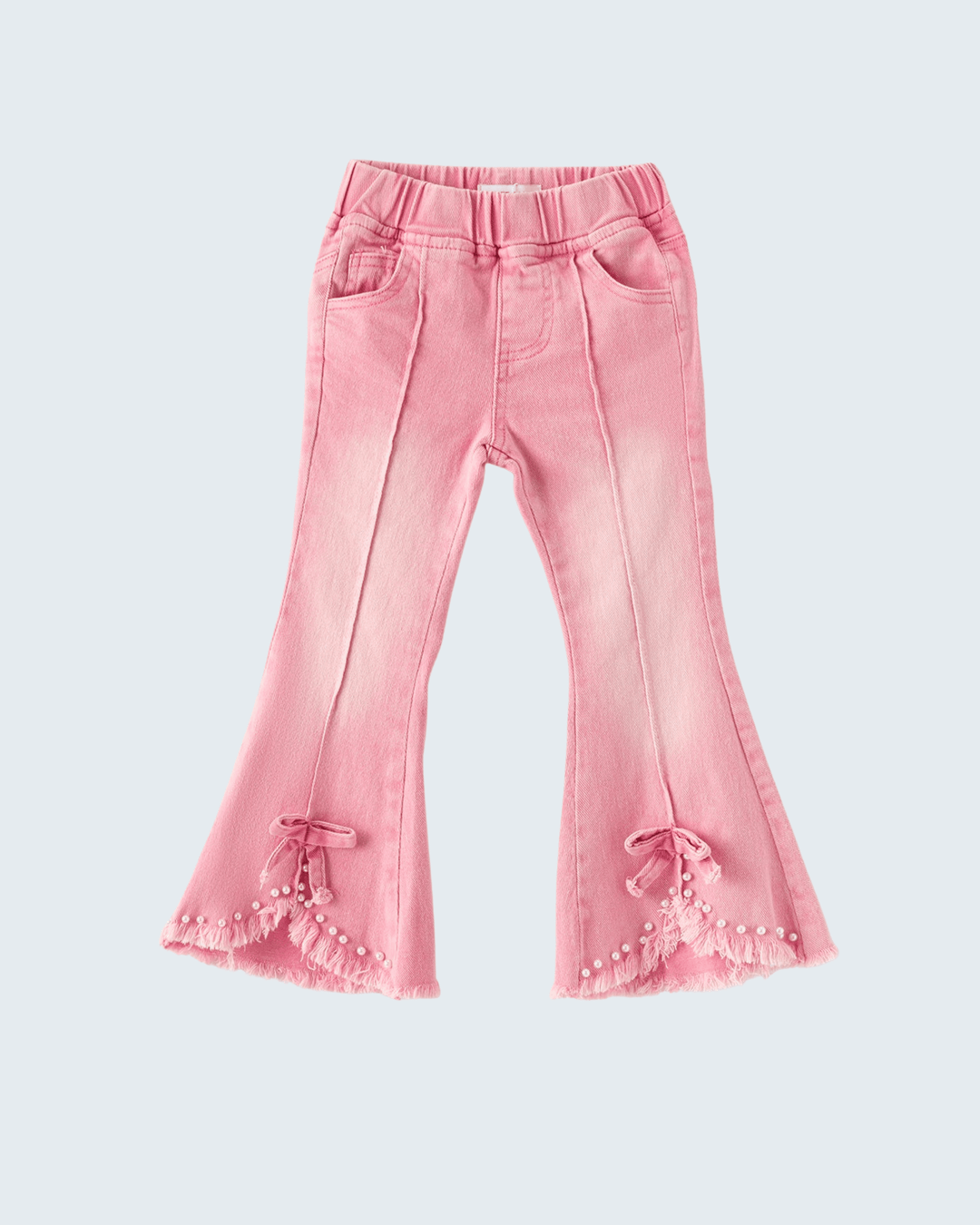 Pink denim flare jeans with bow-and-pearl detail at leg hems