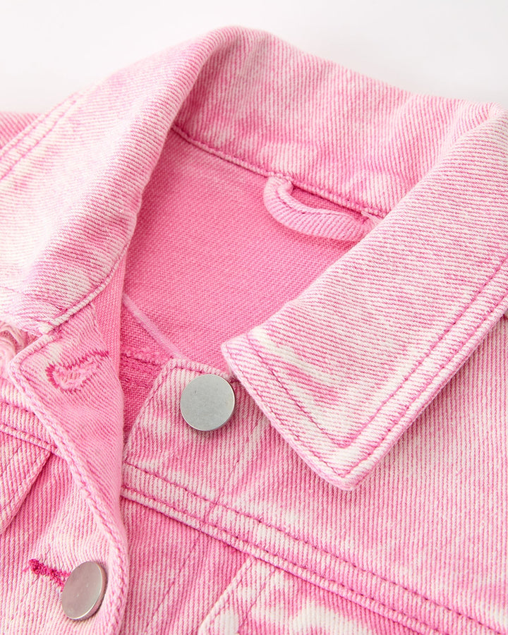 Pink denim jacket close-up of pointed collar and two front button placket