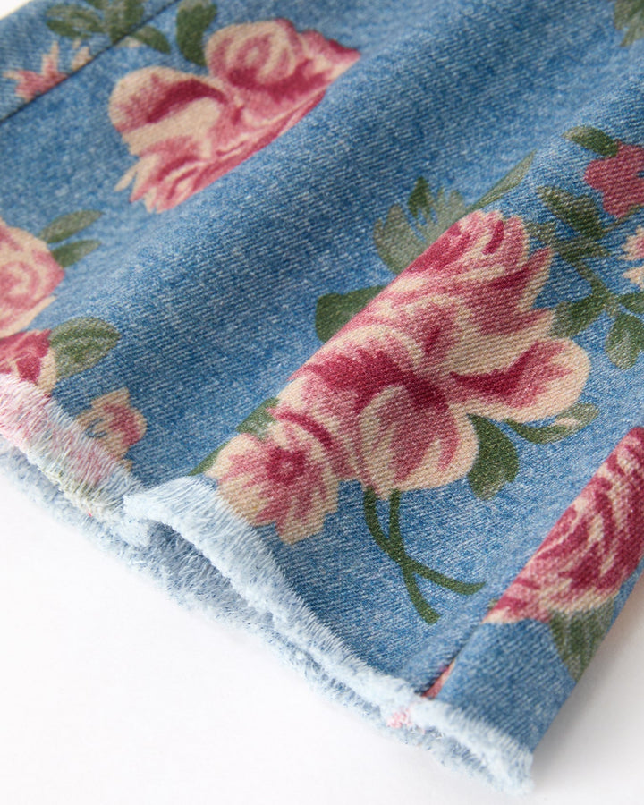 Denim bell-bottom pants hem, rose floral print and frayed edge