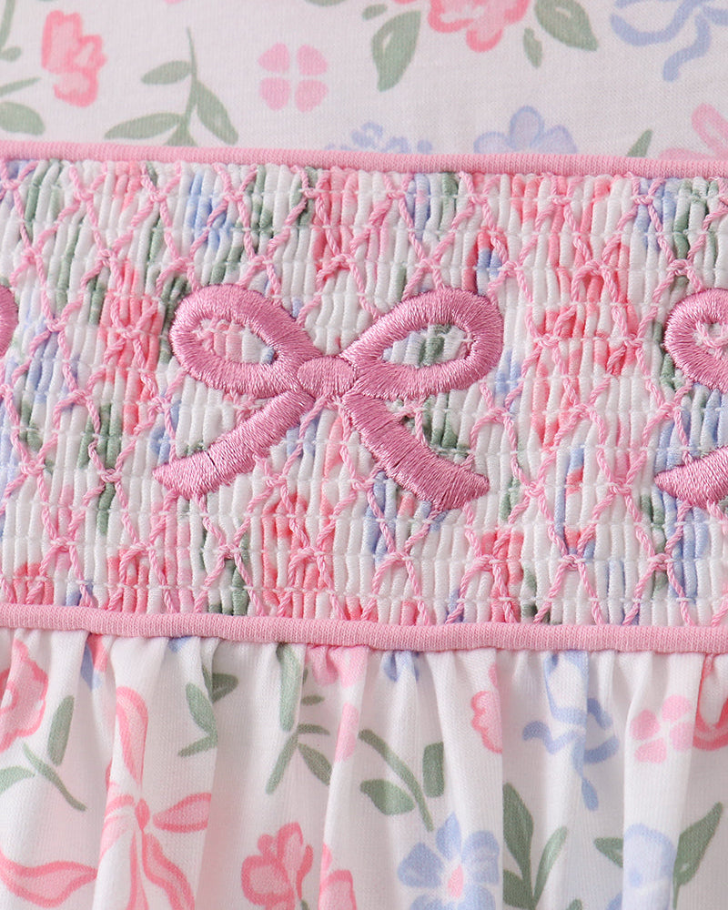 Floral fabric with pink smocked bow detail