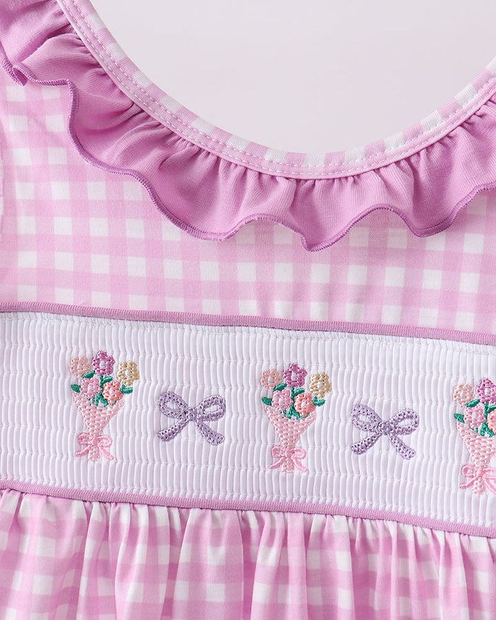 Pink checkered dress with floral and bow embroidery