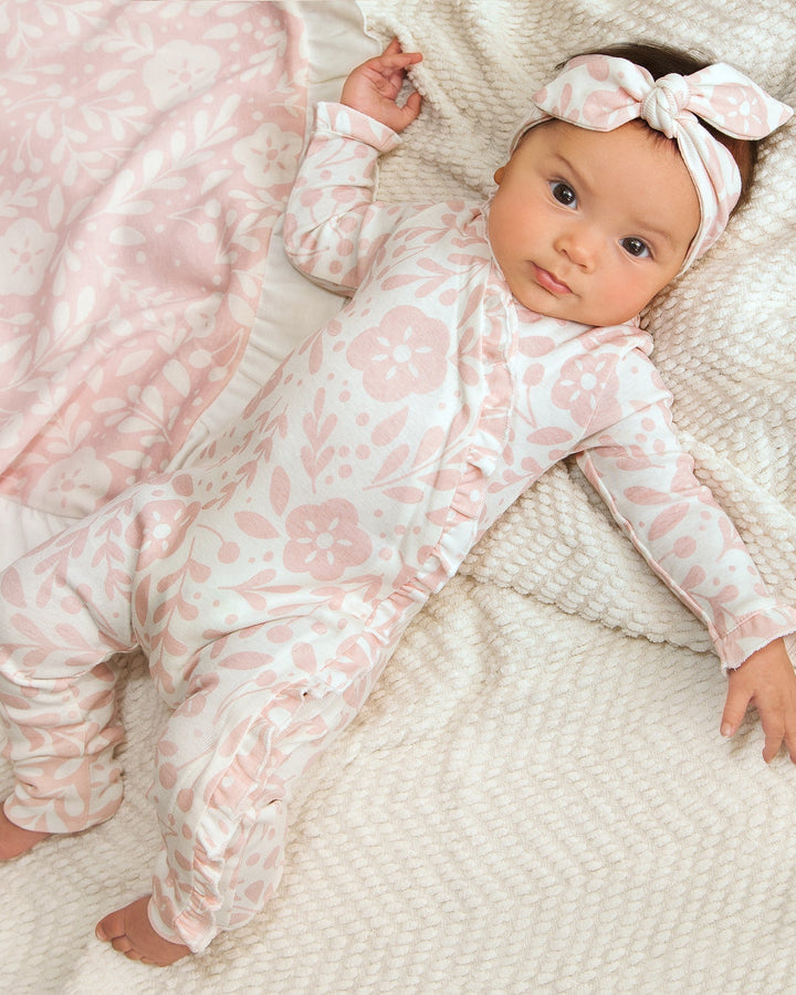 Pink floral cotton zipper romper, long-sleeve footed onesie with front zip.