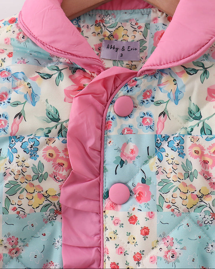 Floral patchwork jacket hood with pink trim and snap-button placket