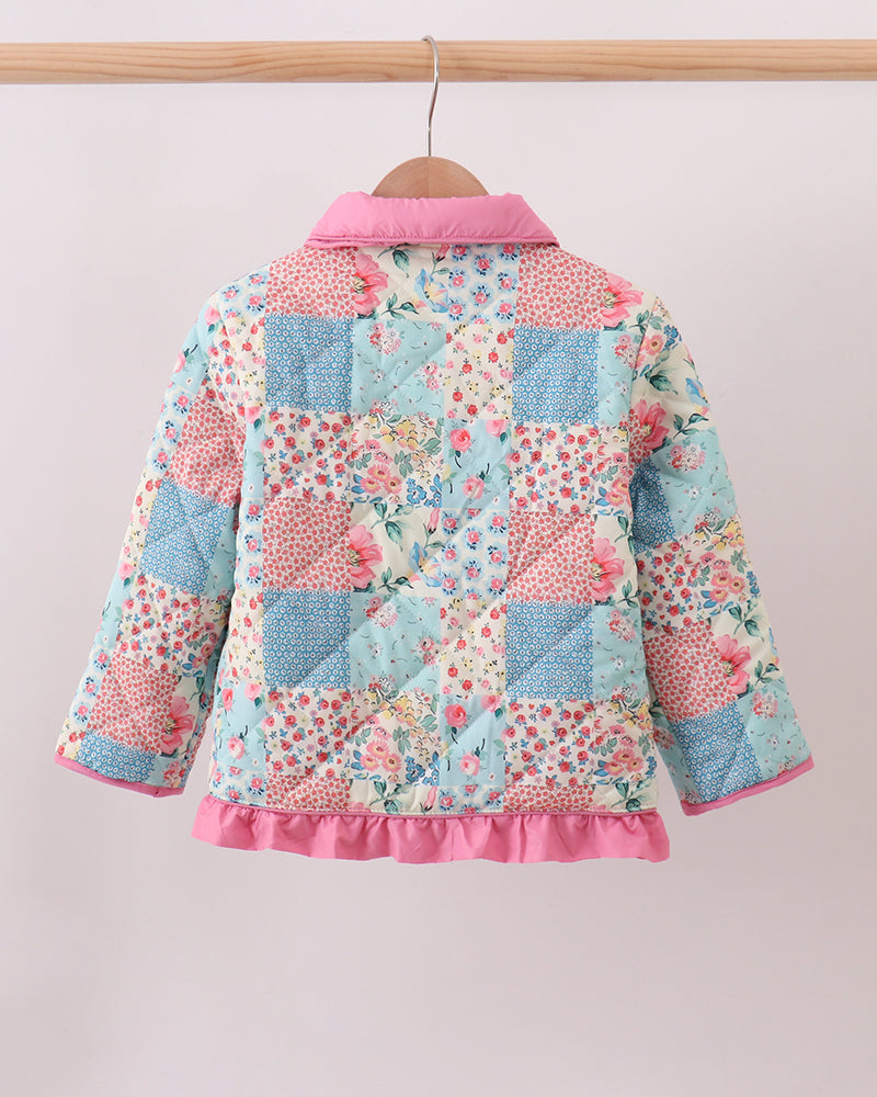 Girls’ patchwork floral ruffle jacket back view with pink hood trim