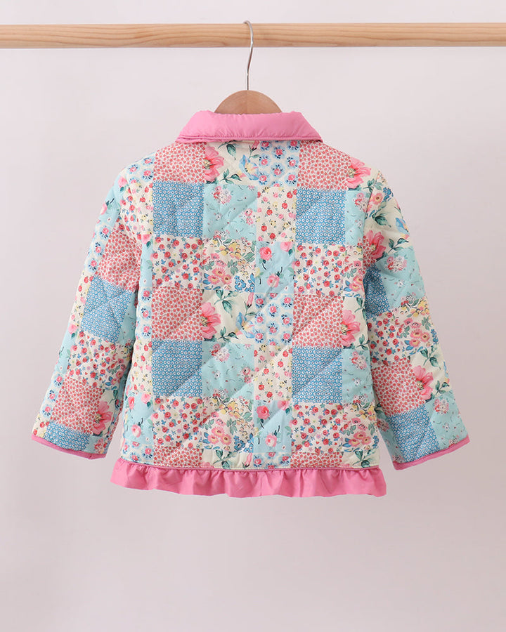 Girls’ patchwork floral ruffle jacket back view with pink hood trim