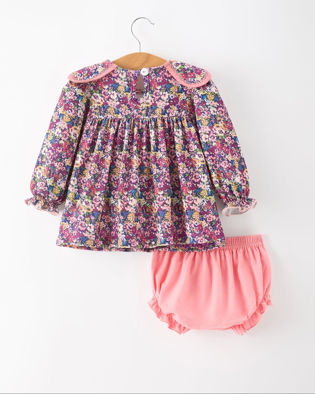 Girls floral long-sleeve dress with ruffled yoke and pink bloomers