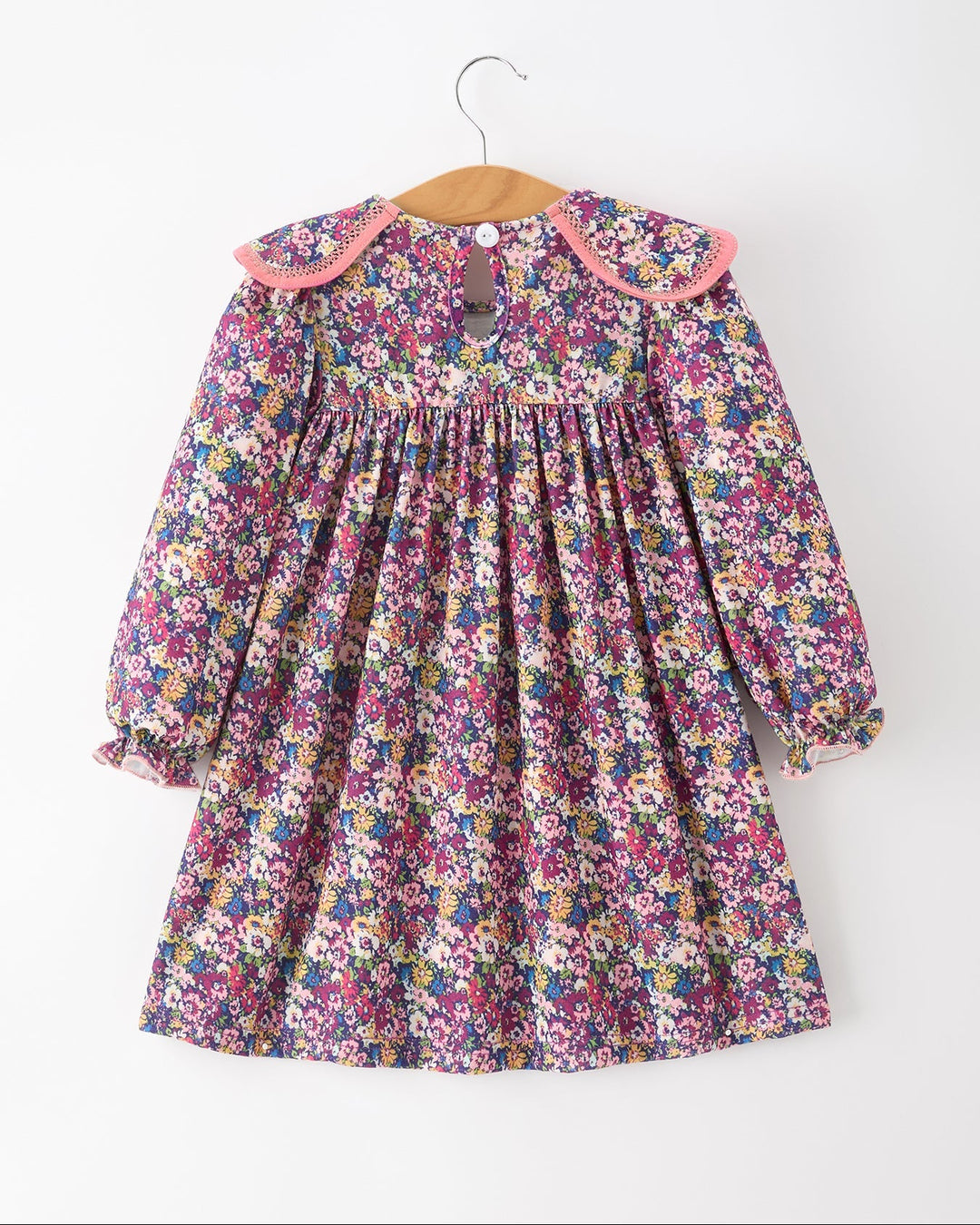 Girls floral dress, back view with gathered yoke and Peter Pan collar