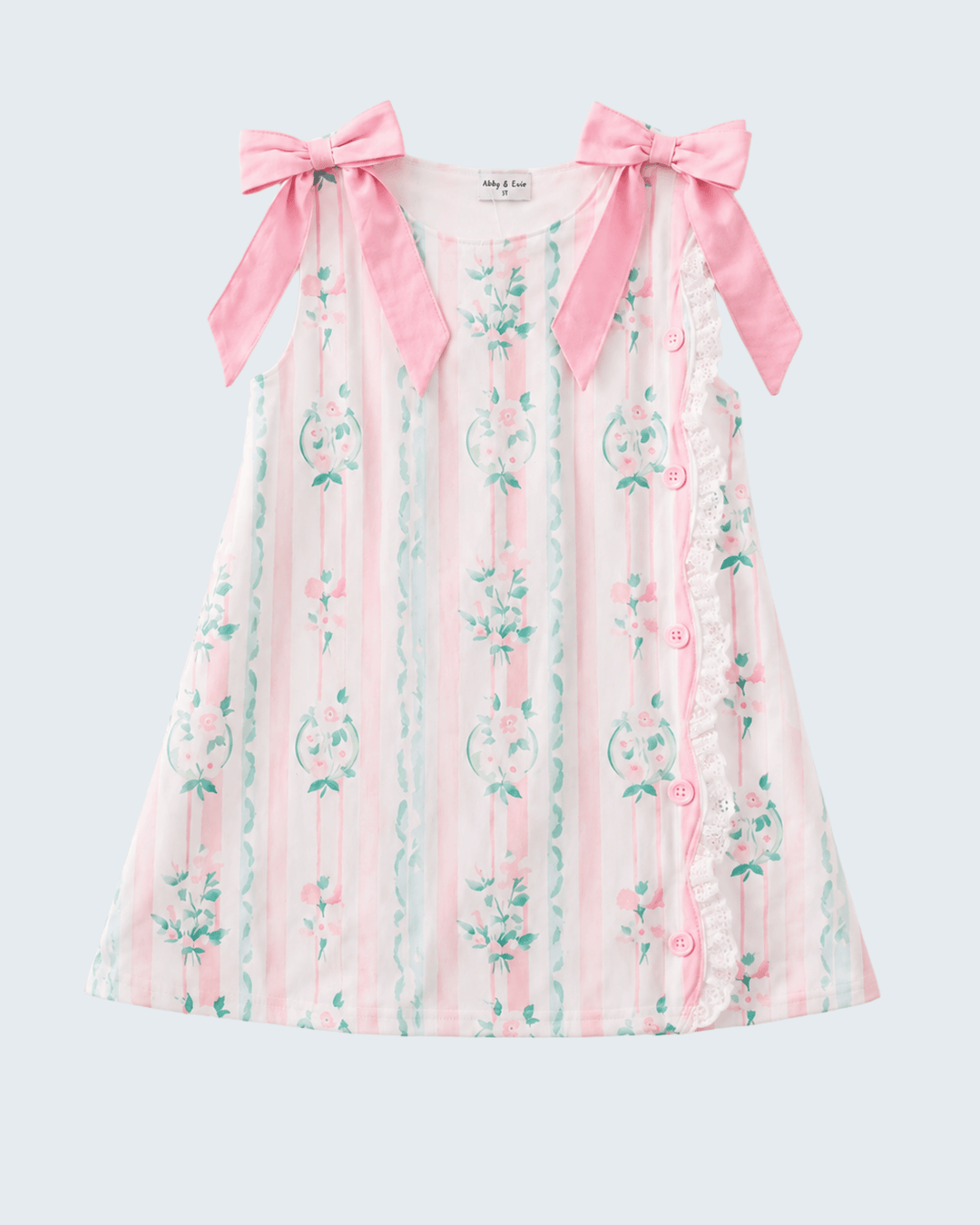 Floral dress with pink bows on a light gray background