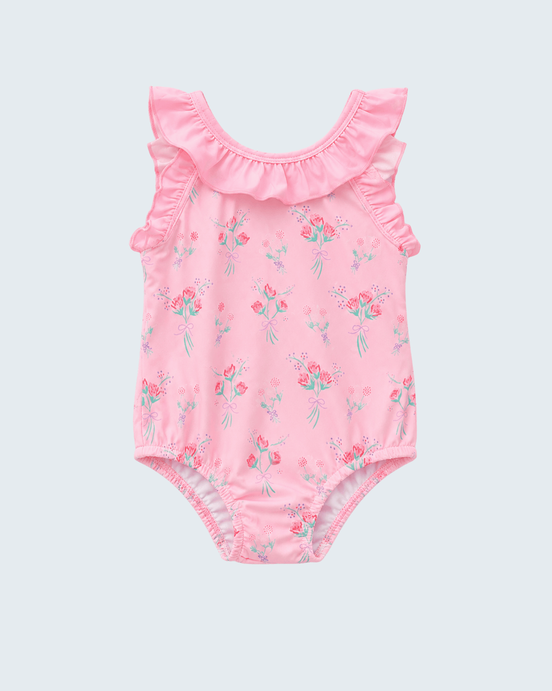 Pink floral baby swimsuit with ruffled details on a light gray background
