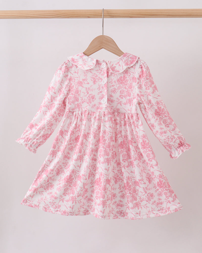 Pink floral long-sleeve smocked dress with ruffled collar and gathered full skirt