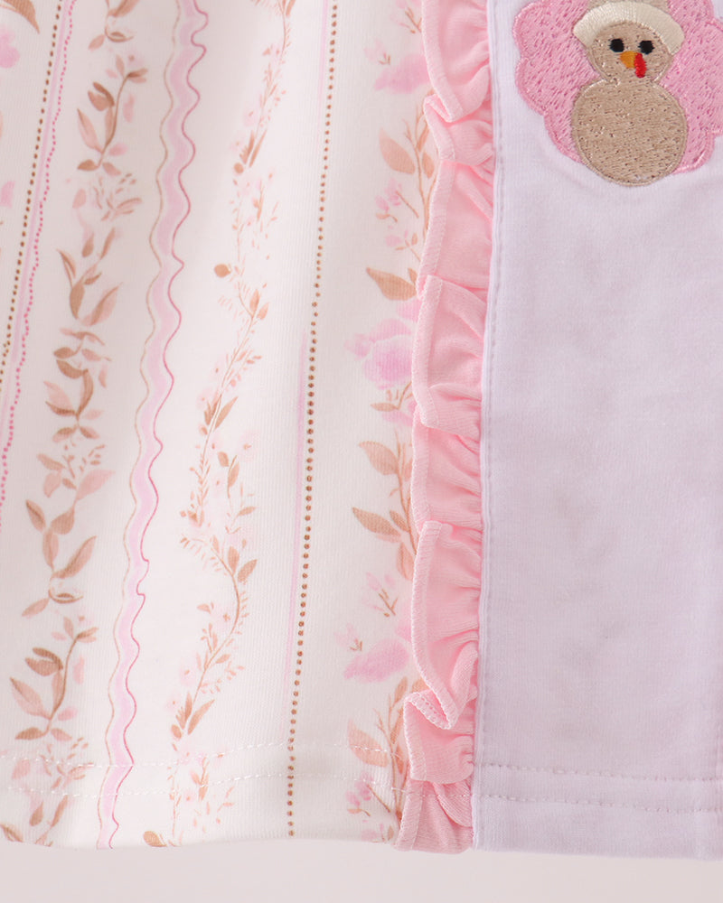 Pink floral dress with ruffle trim and turkey embroidery