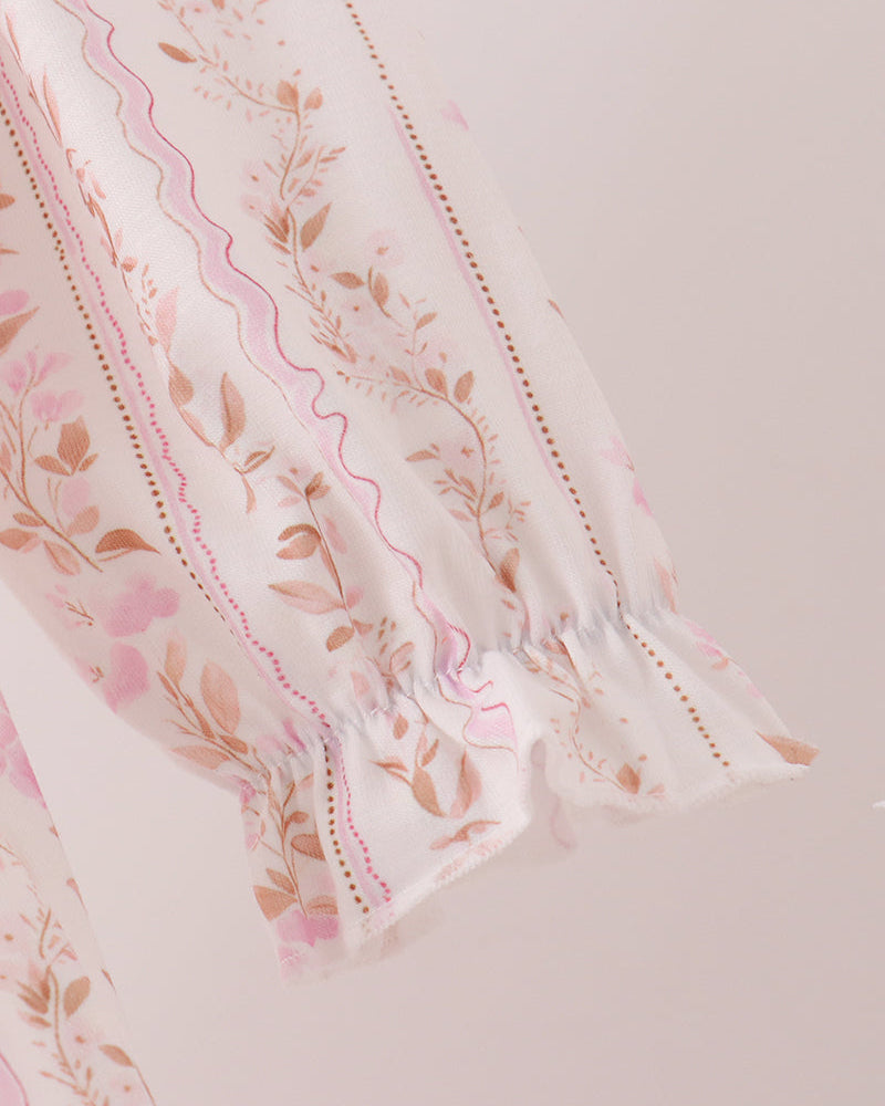 Pink floral striped dress fabric with gathered ruffle sleeve hem