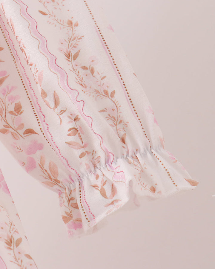 Pink floral striped dress fabric with gathered ruffle sleeve hem