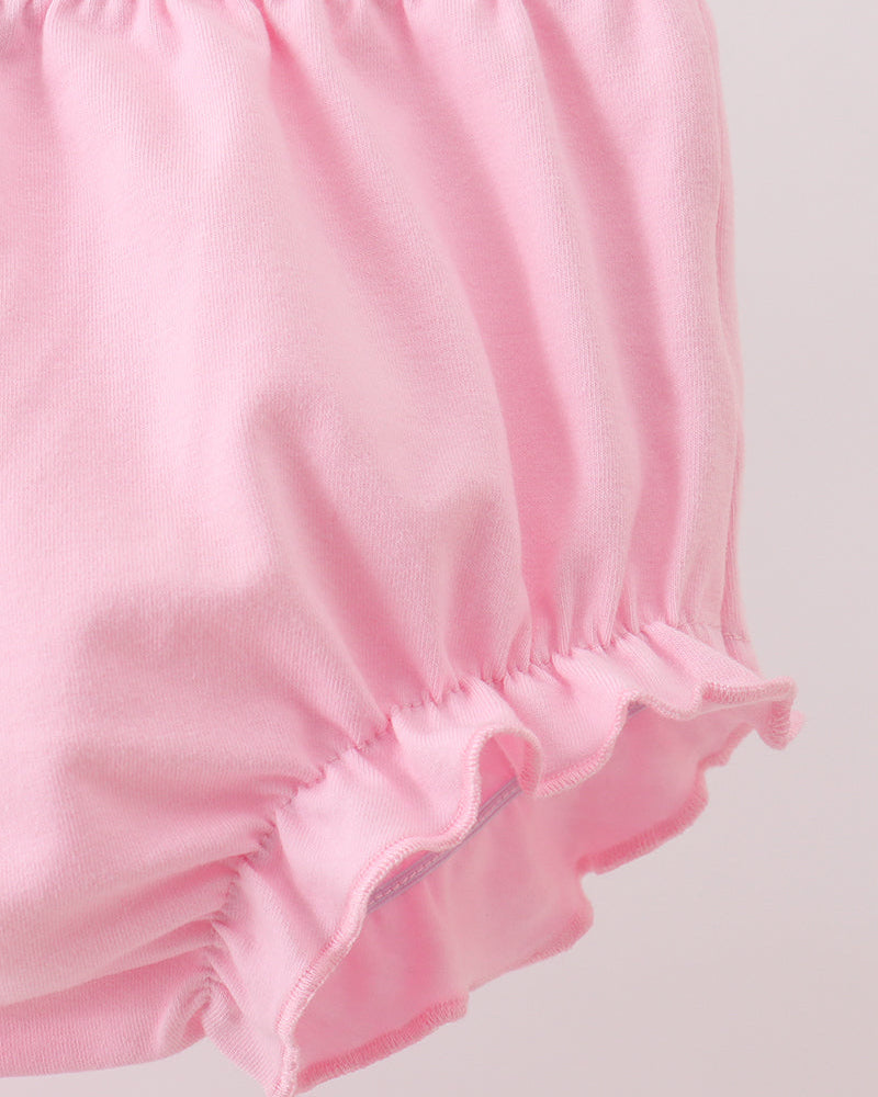 Pink fabric bloomer with ruffled elastic hem, soft pink
