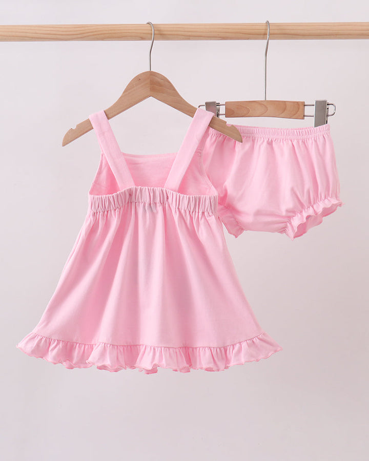 Pink sleeveless dress with ruffled skirt and matching bloomer set