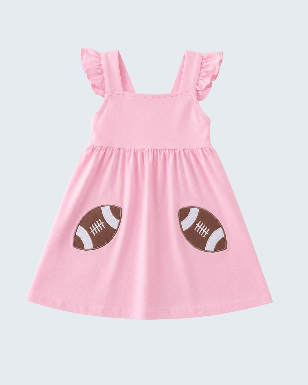 Pink sleeveless dress with football applique patches and ruffled shoulders