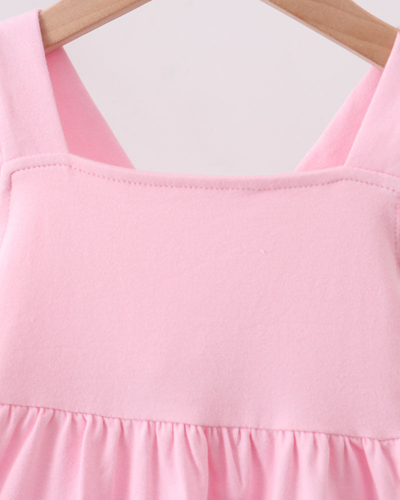 Pink sleeveless dress with ruffled neckline and gathered skirt