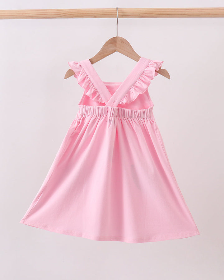 Pink sleeveless ruffle-strap dress on a hanger