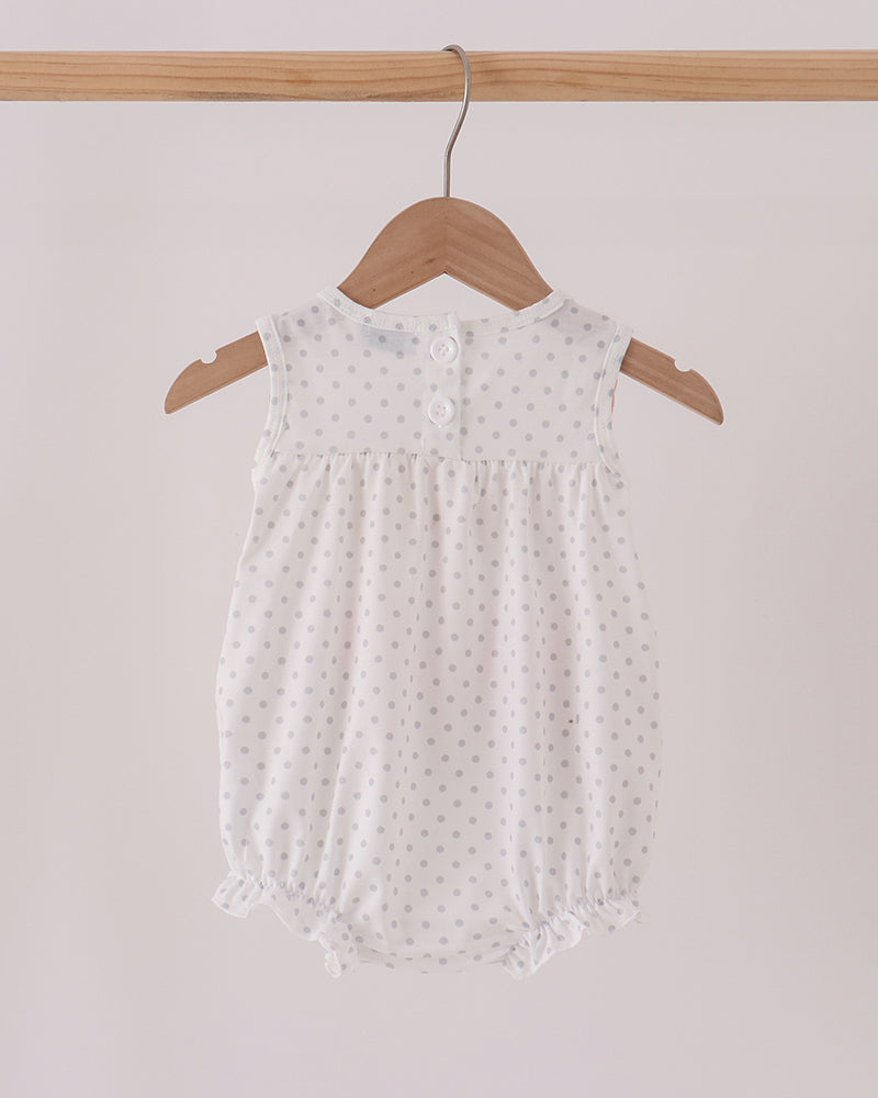 Baby bubble romper with small gray polka dots, sleeveless and buttoned back