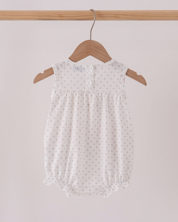 Baby bubble romper with small gray polka dots, sleeveless and buttoned back