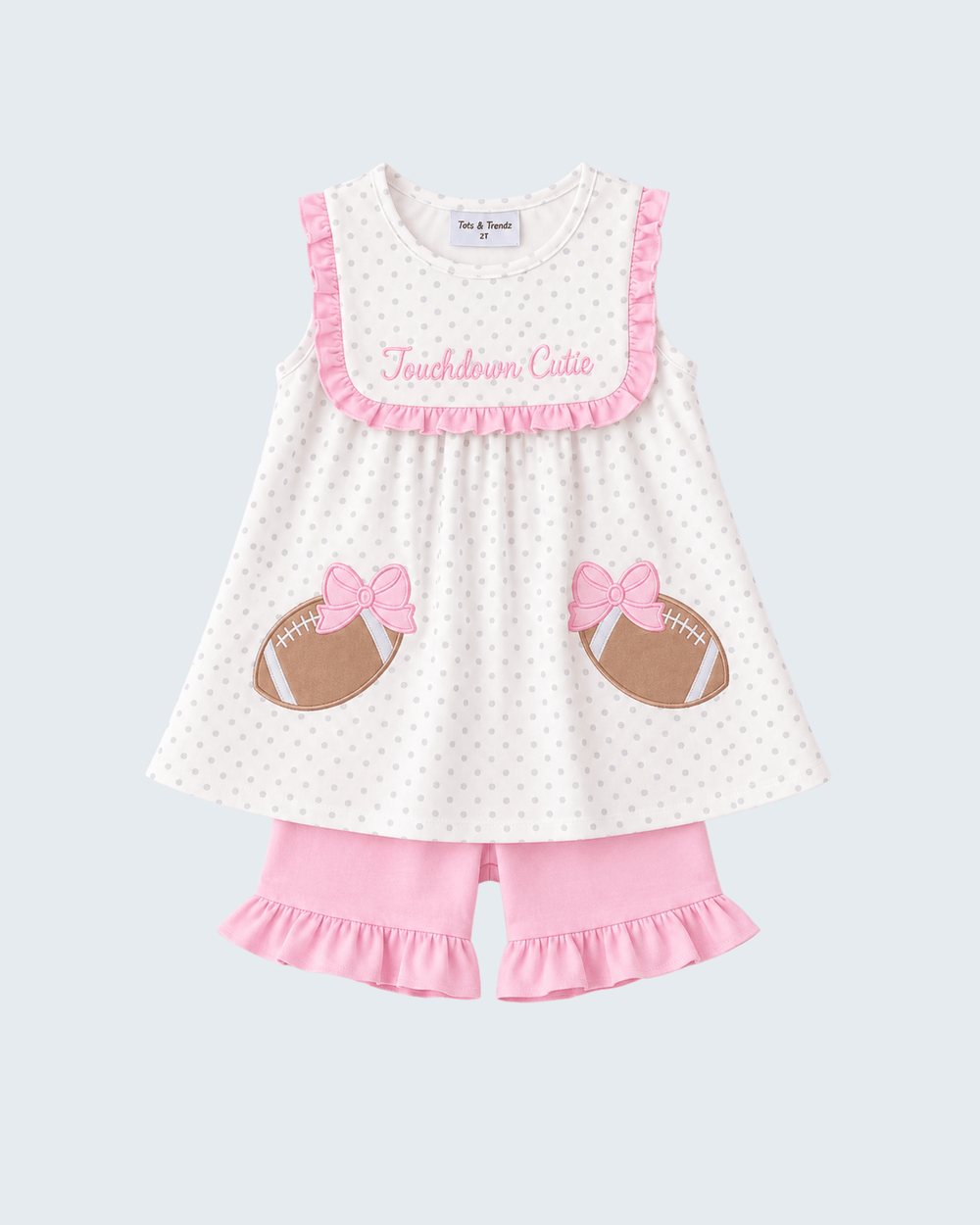 Polka-dot dress and pink ruffle shorts set with football applique and 'Touchdown Cutie'