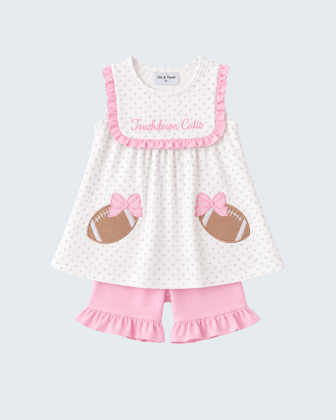 Polka-dot dress and pink ruffle shorts set with football applique and &