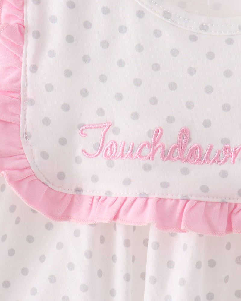 White dress with pink ruffled collar and pink embroidered &